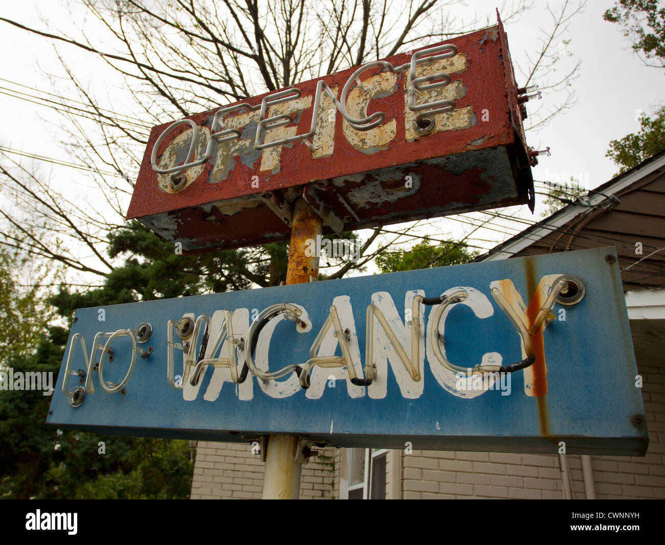An old sign in front of a motel Stock Photo