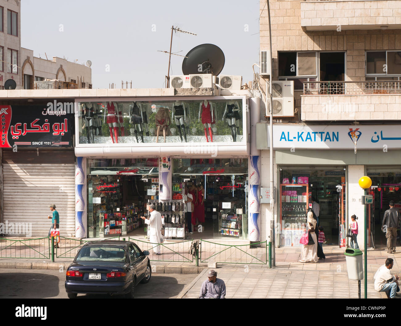 Shopping street in Aqaba Jordan shop window on top floor showing mannequins  with lingerie on display Stock Photo - Alamy