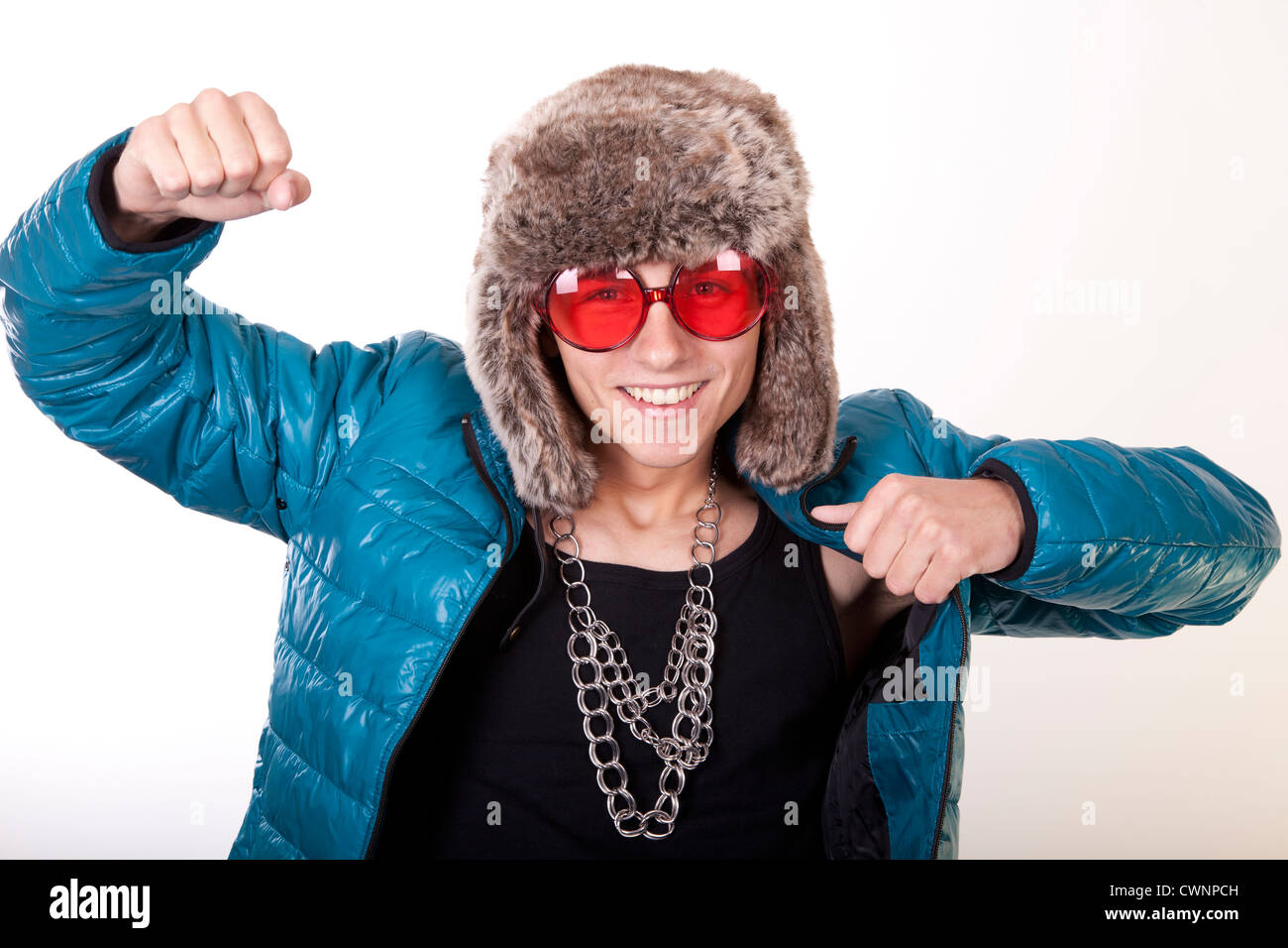Portrait of a young attractive man dancing and smiling. Stock Photo
