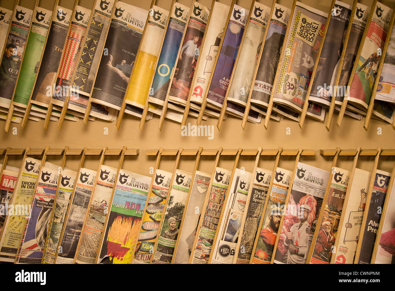 Newspaper rack with back issues of The Reykjavik Grapevine Stock Photo