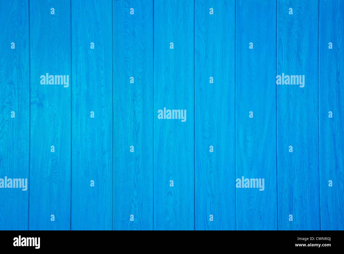 Wooden wall painted bright blue Stock Photo