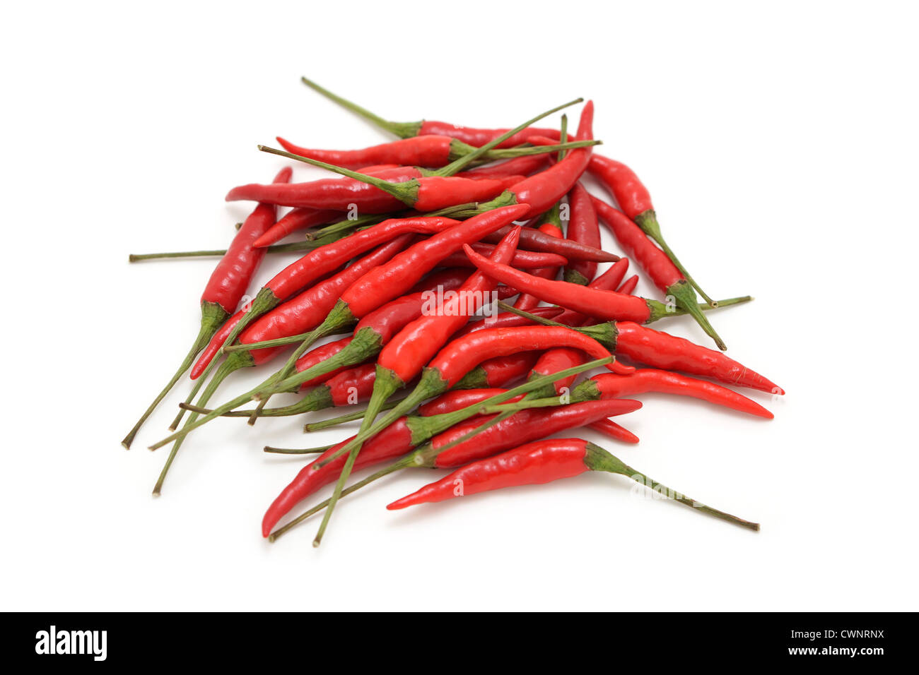 Pile dried Cayenne pepper isolated on white background. Also called Guinea  spice, cow-horn pepper, aleva, bird pepper, red pepper, hot chili pepper  Stock Photo - Alamy