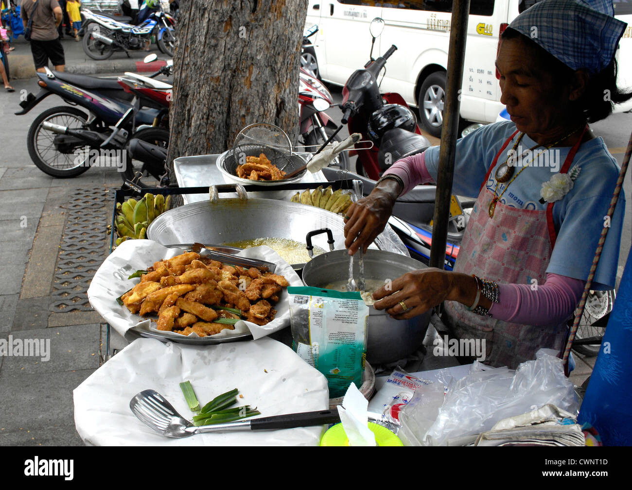 Thai lady selling food Stock Photo