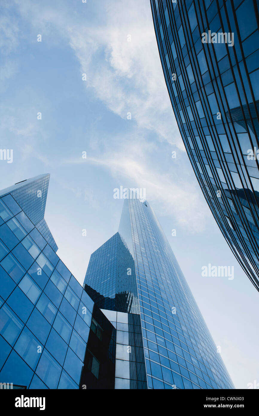 Facade of skyscrapers against sky, low angle view Stock Photo - Alamy