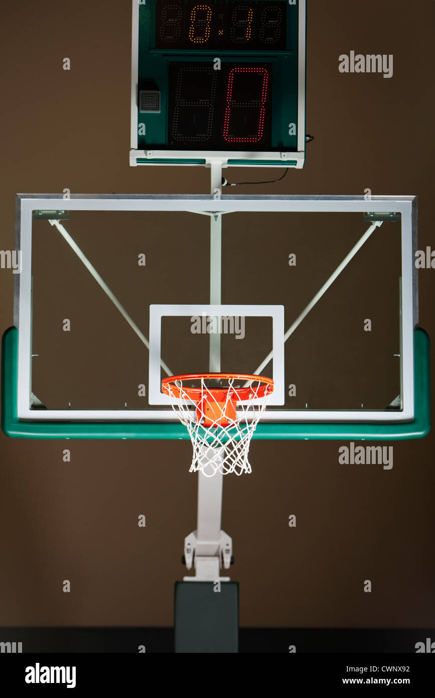 Basketball hoop with backboard and scoreboard Stock Photo