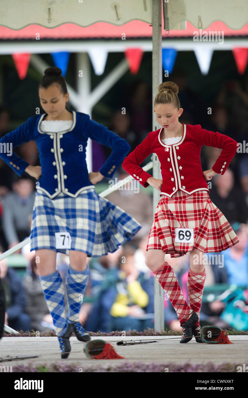 Highland dancers compete in the Highland Games of the Braemar Gathering in Aberdenshire, Scotland Stock Photo