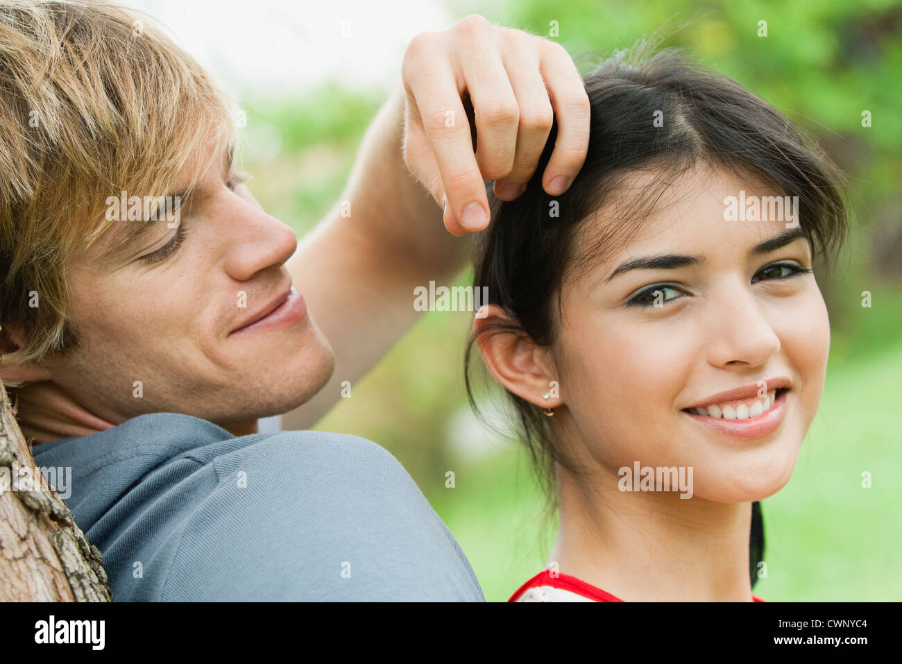 Young couple together outdoors, portrait Stock Photo