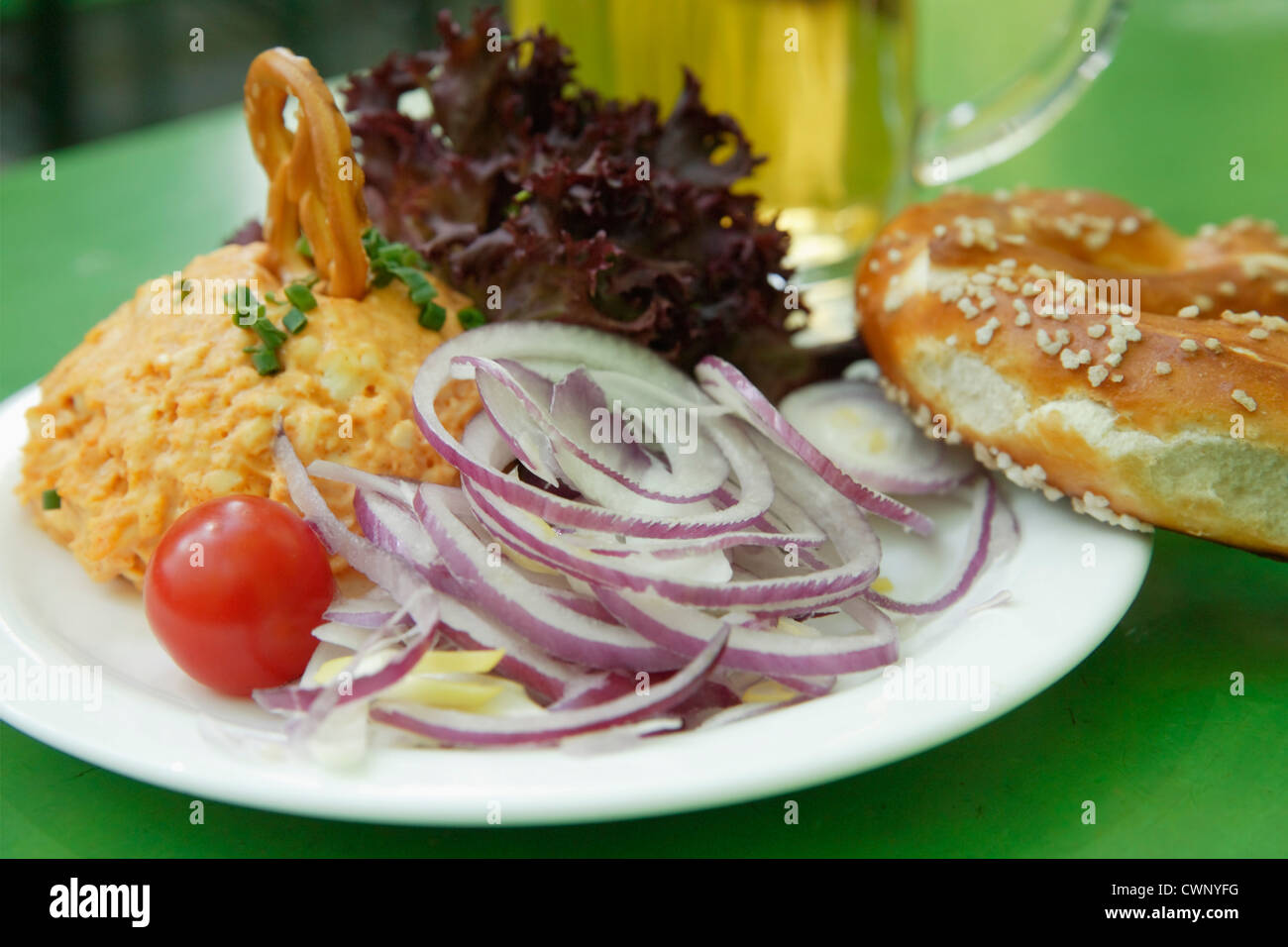 Germany, Bavaria, Munich, Vegetarian dish with mug of beer, close up Stock Photo