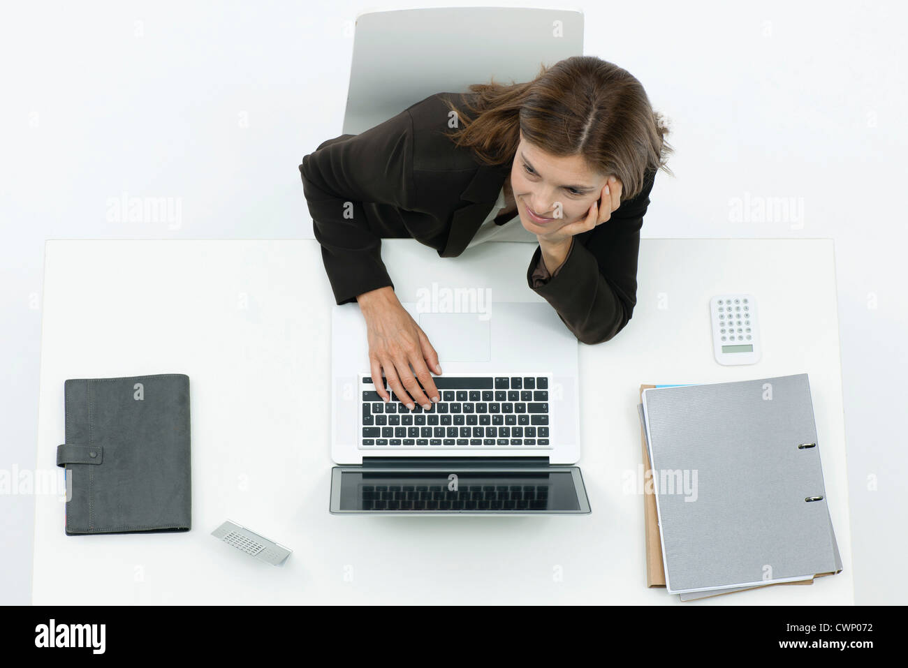 Woman leaning on elbows desk hi-res stock photography and images - Alamy