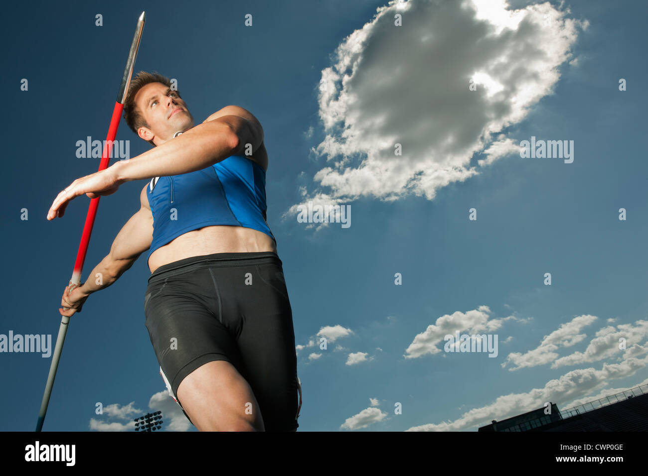 Javelin thrower aiming, low angle view Stock Photo