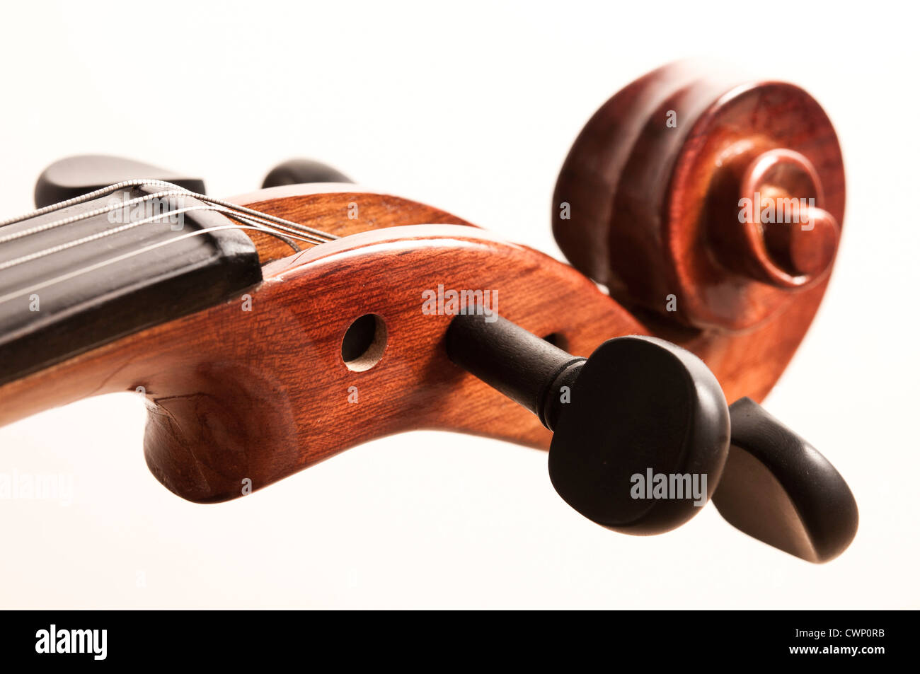 closeup of a violin scroll and pegbox Stock Photo - Alamy