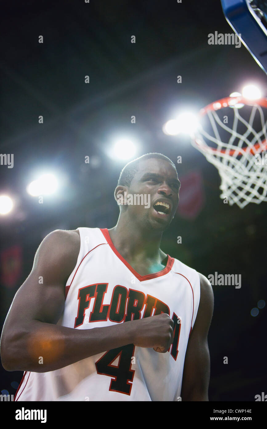 Basketball player cheering Stock Photo Alamy