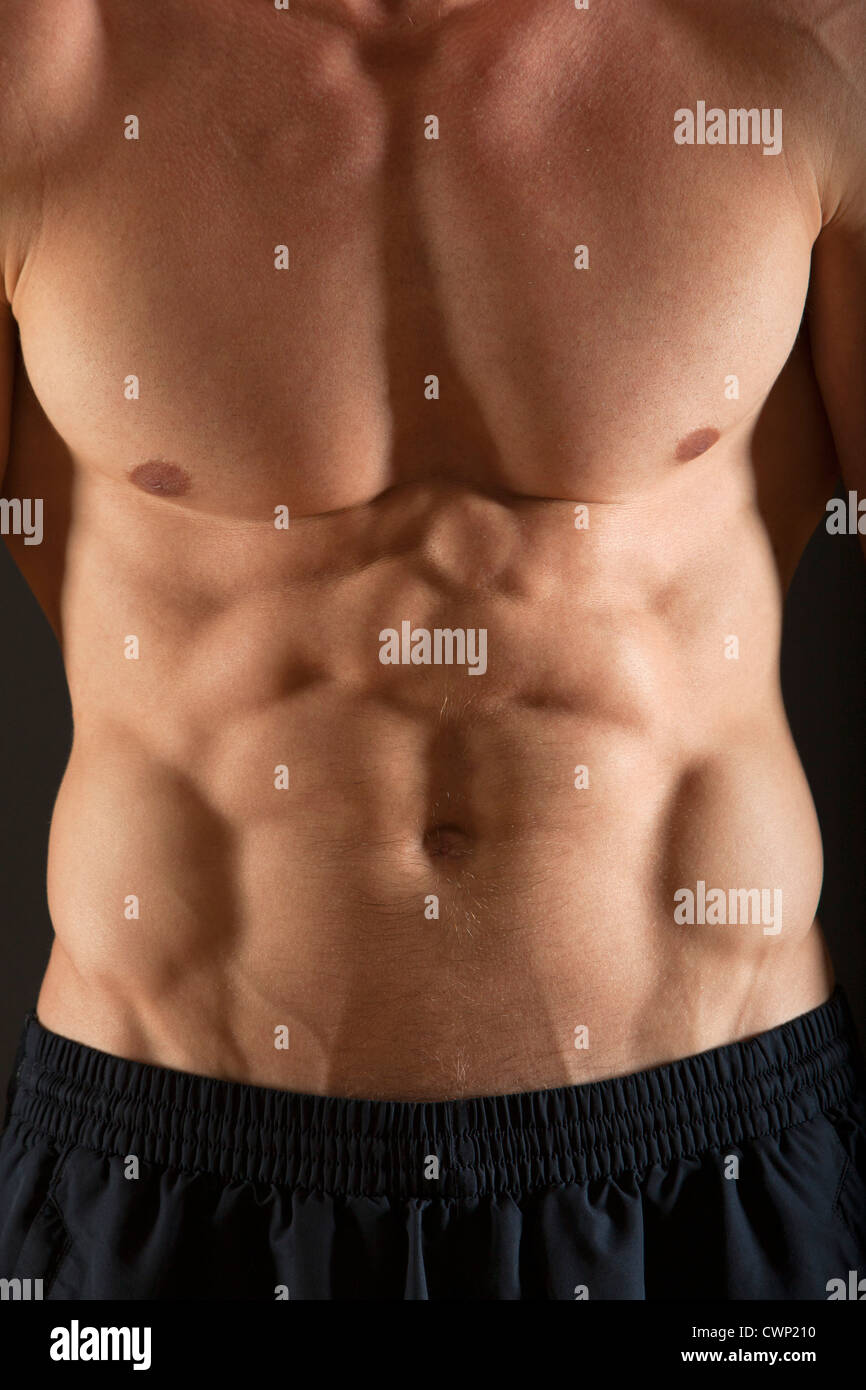 Barechested muscular man, mid section Stock Photo