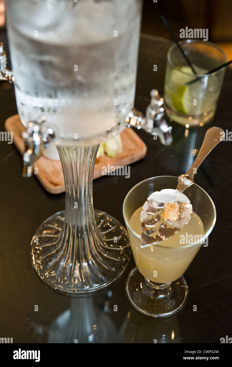 Absinthe shot served the traditional way using a sugar cube Stock Photo