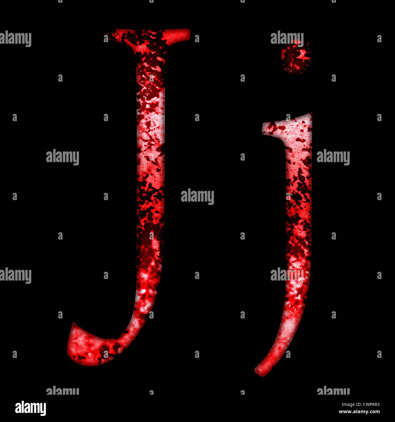 grunge font letter j on a black background Stock Photo