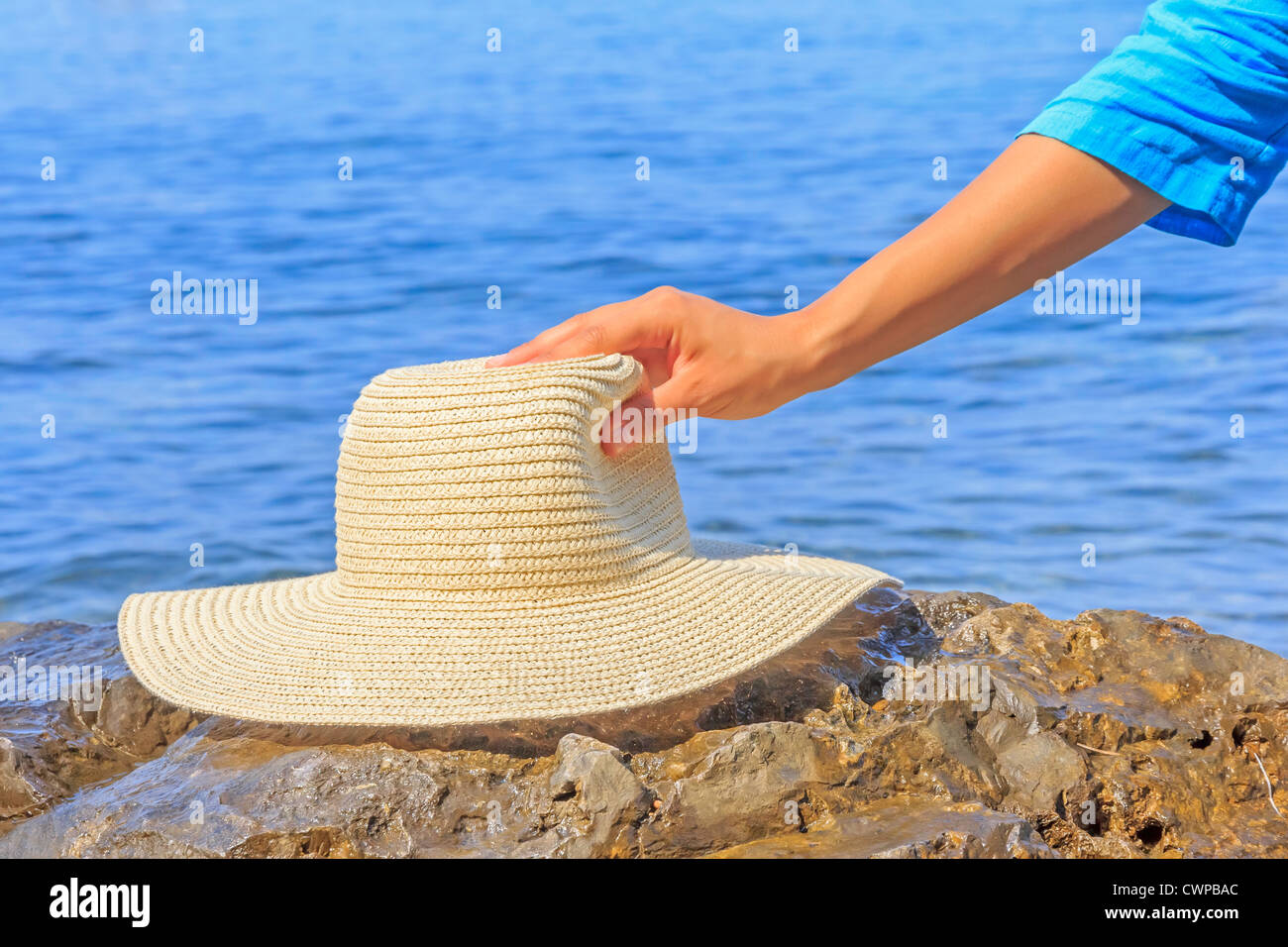 Hand Holding Hat Brim High Resolution Stock Photography and Images - Alamy