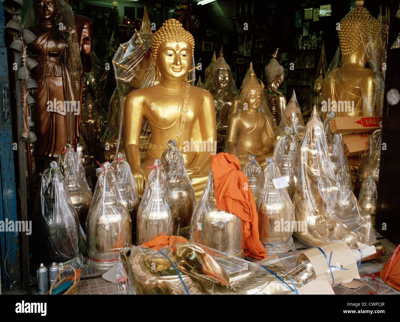 Buddhist sculpture in Bangkok in Thailand in Far East Southeast Asia. Shop Display The Buddha Icon Beauty Beautiful Serenity Serene Travel Stock Photo