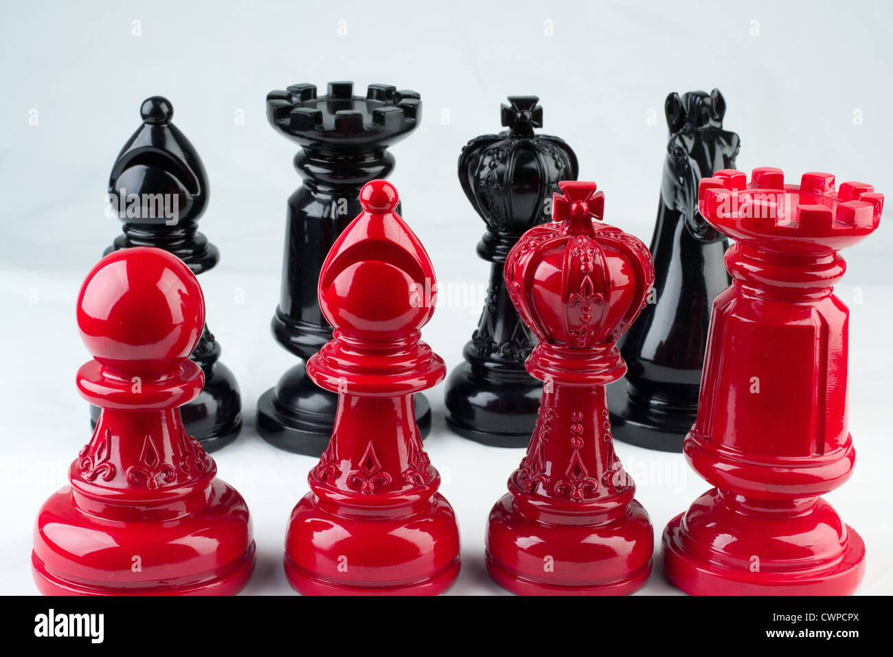 Chess game with red and black pieces Stock Photo - Alamy