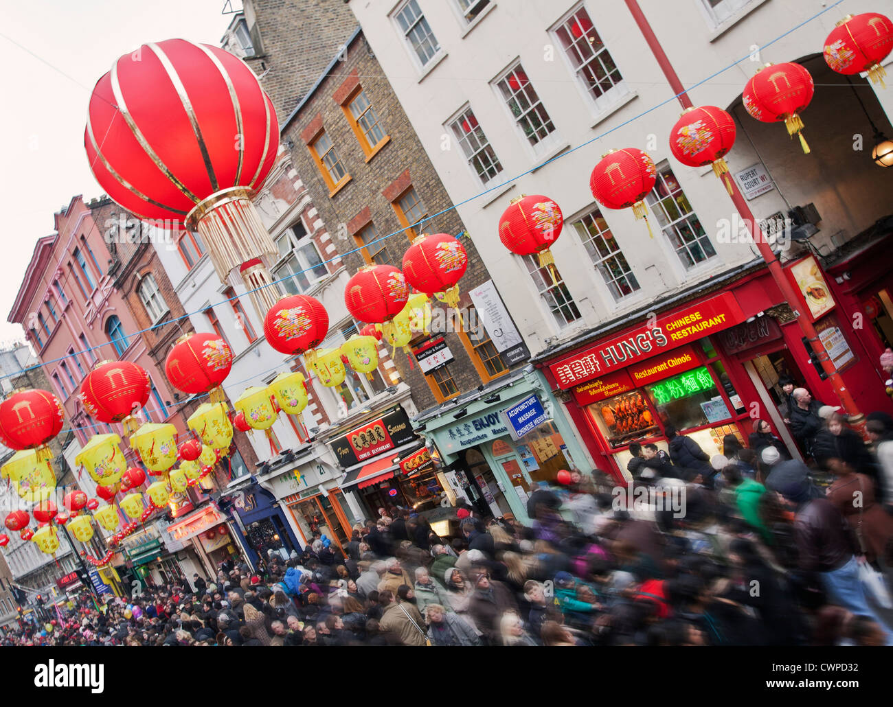 UK. England. London. Crowds in Chinatown during Chinese New Year celebrations. Stock Photo