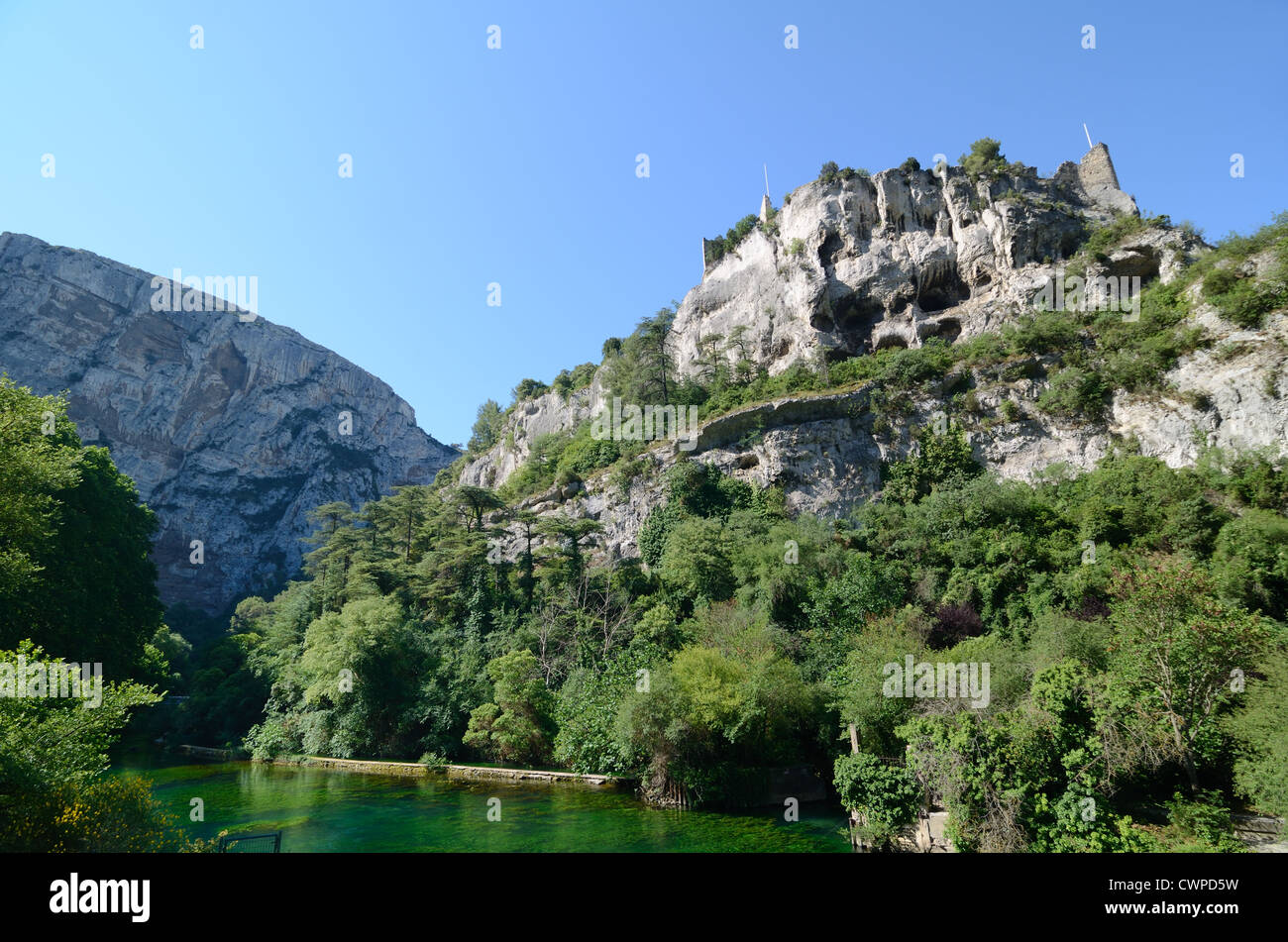 Ruined Castle, Château, Fort or Fortress and River Sorgue at Fontaine-de-Vaucluse Provence France Stock Photo