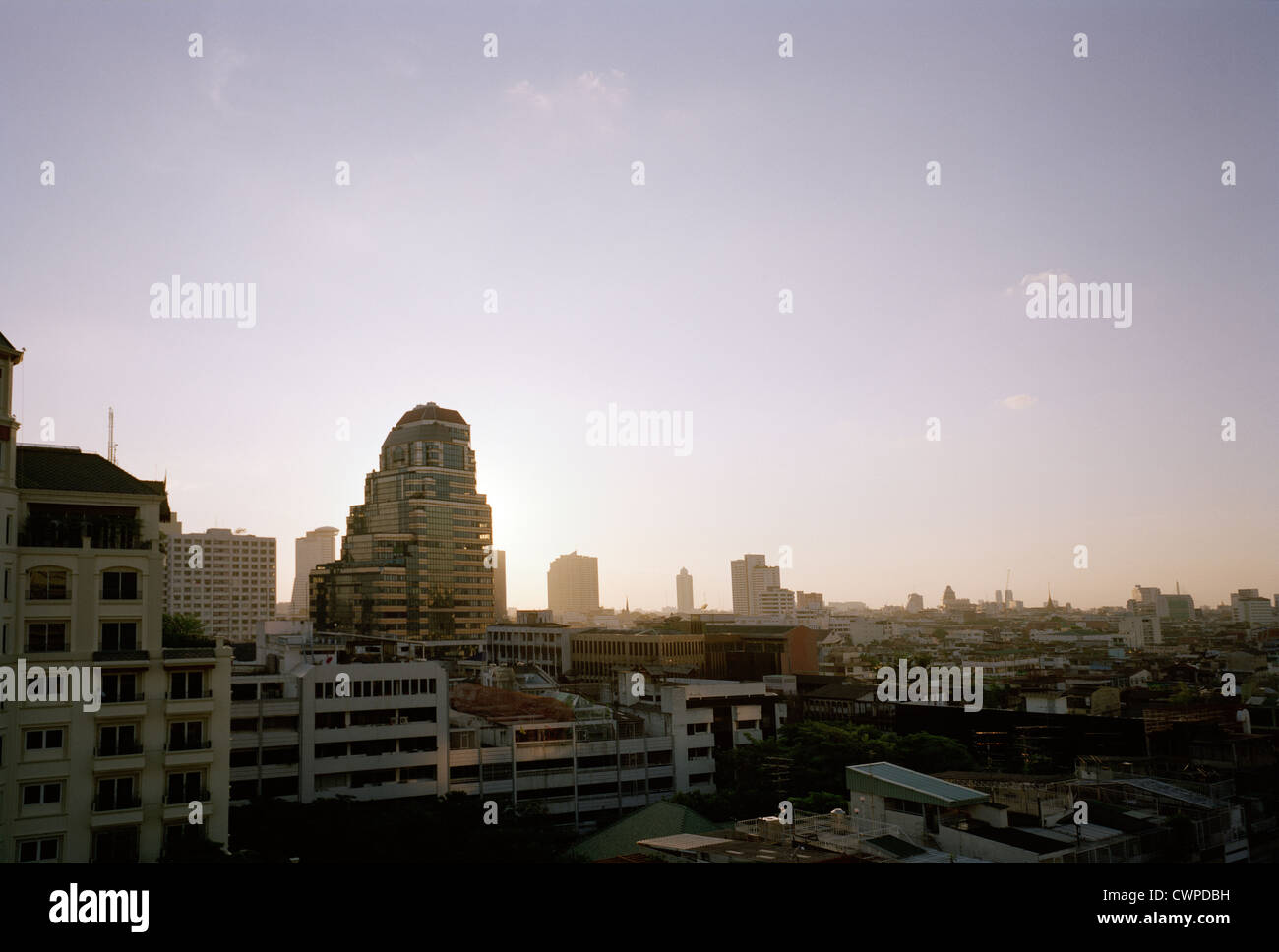 Twilight sunset dusk sky over Silom Sathorn in Bangkok in Thailand in Far East Southeast Asia. Thai Sunset Dusk City Cities Wanderlust Escapism Travel Stock Photo