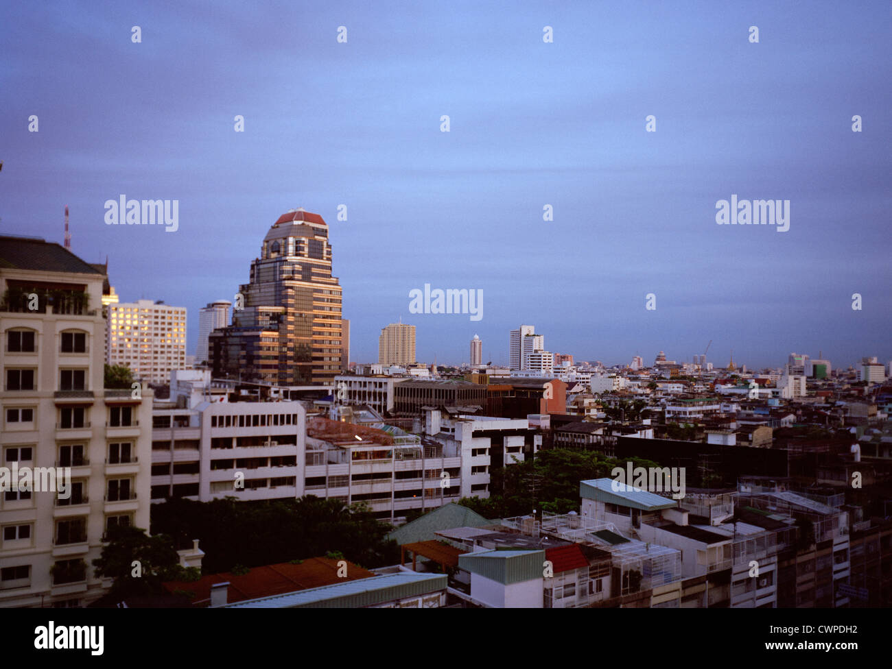 Twilight sunset dusk sky over Silom Sathorn in Bangkok in Thailand in Far East Southeast Asia. Thai Sunset Dusk City Cities Wanderlust Escapism Travel Stock Photo