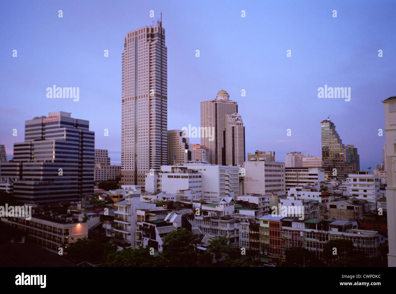 Twilight sunset dusk sky over Silom Sathorn in Bangkok in Thailand in Far East Southeast Asia. Thai Sunset Dusk City Cities Wanderlust Escapism Travel Stock Photo