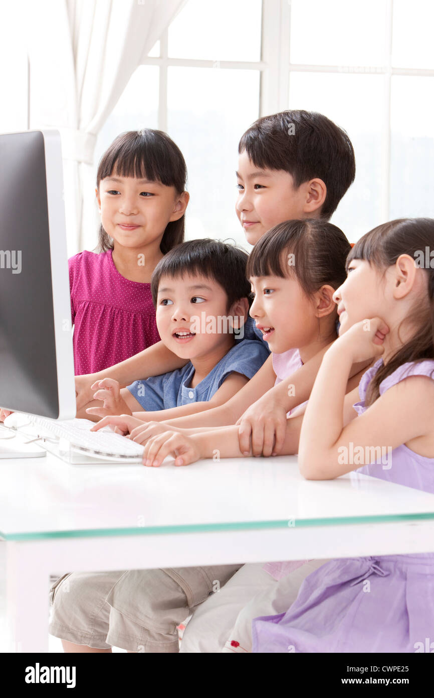 Children using computer at home Stock Photo - Alamy