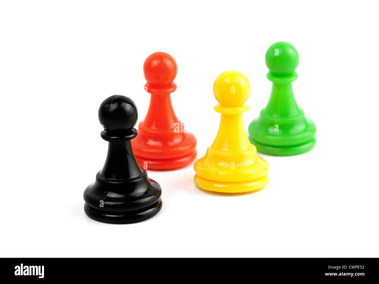 four wooden colorful pawns isolated on white background Stock Photo