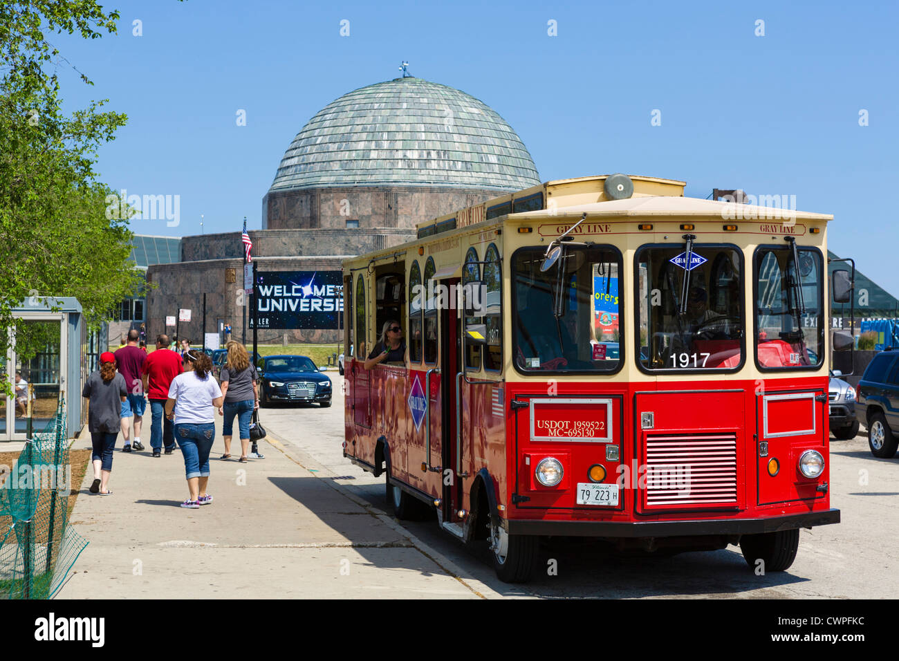 Gray Line trolley tour in front of the Adler Planetarium on the Museum Campus in Grant Park, Chicago, Illinois, USA Stock Photo