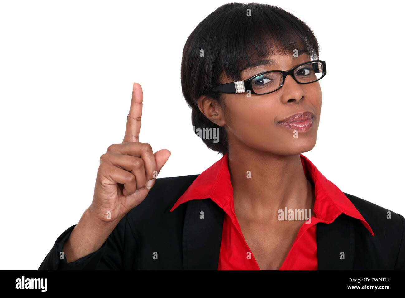 Woman holding her index finger up Stock Photo - Alamy