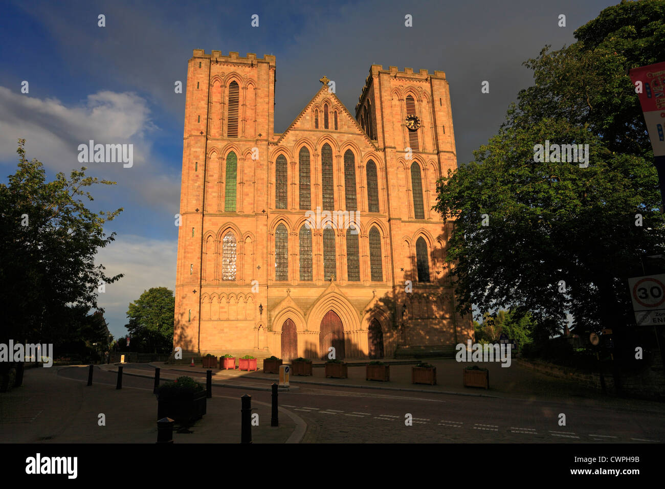 The West front of Ripon Cathedral in evening sunlight, Ripon, North Yorkshire, England, UK. Stock Photo