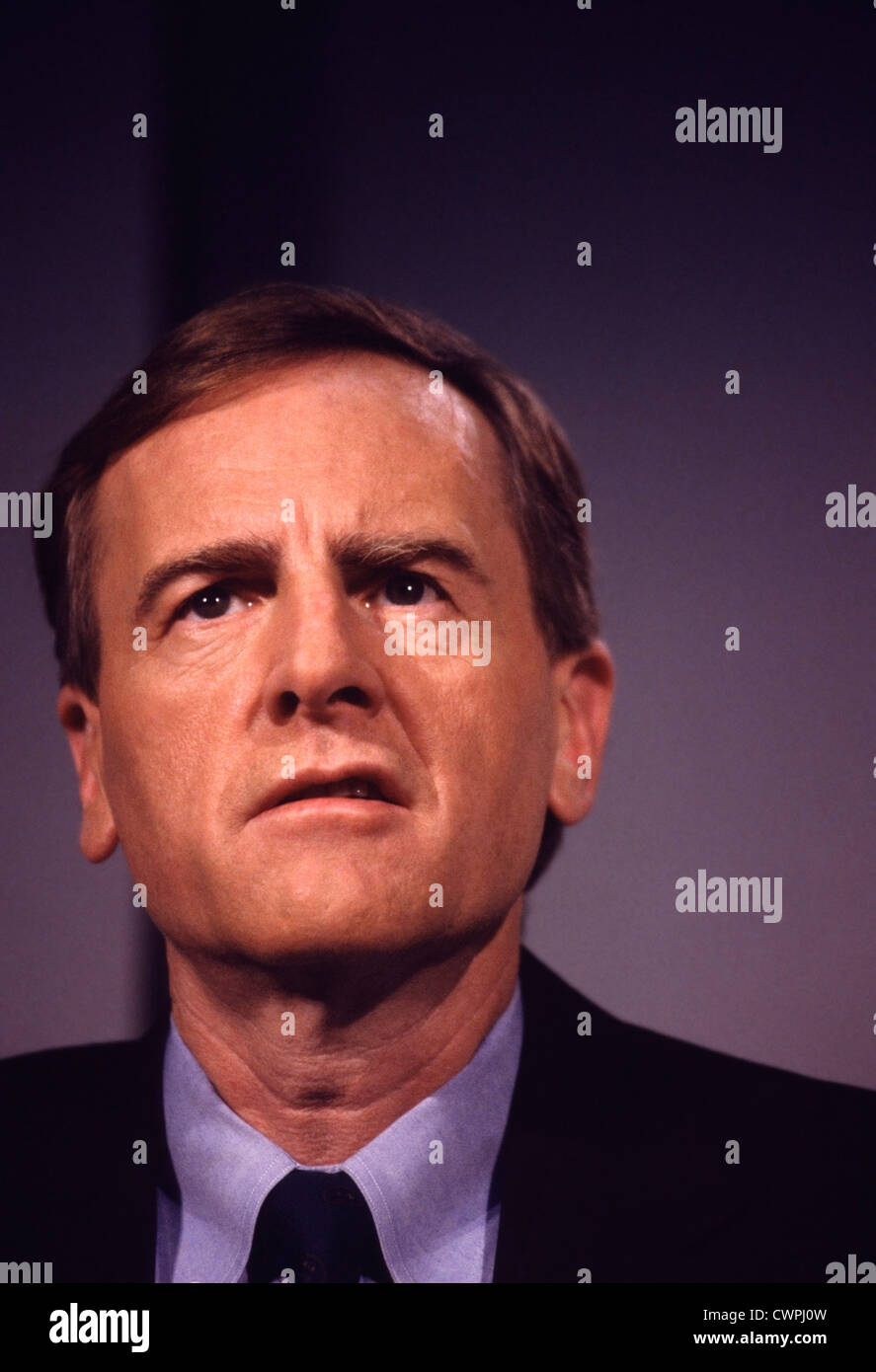 John Sculley, Apple CEO from 1983 until 1993, during a television appearance to  announce three new low-cost Macs in 1990. Stock Photo