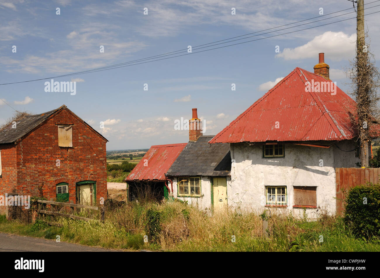 A dilapidated cottage and outbuildings in Oving, Buckinghamshire, England Stock Photo