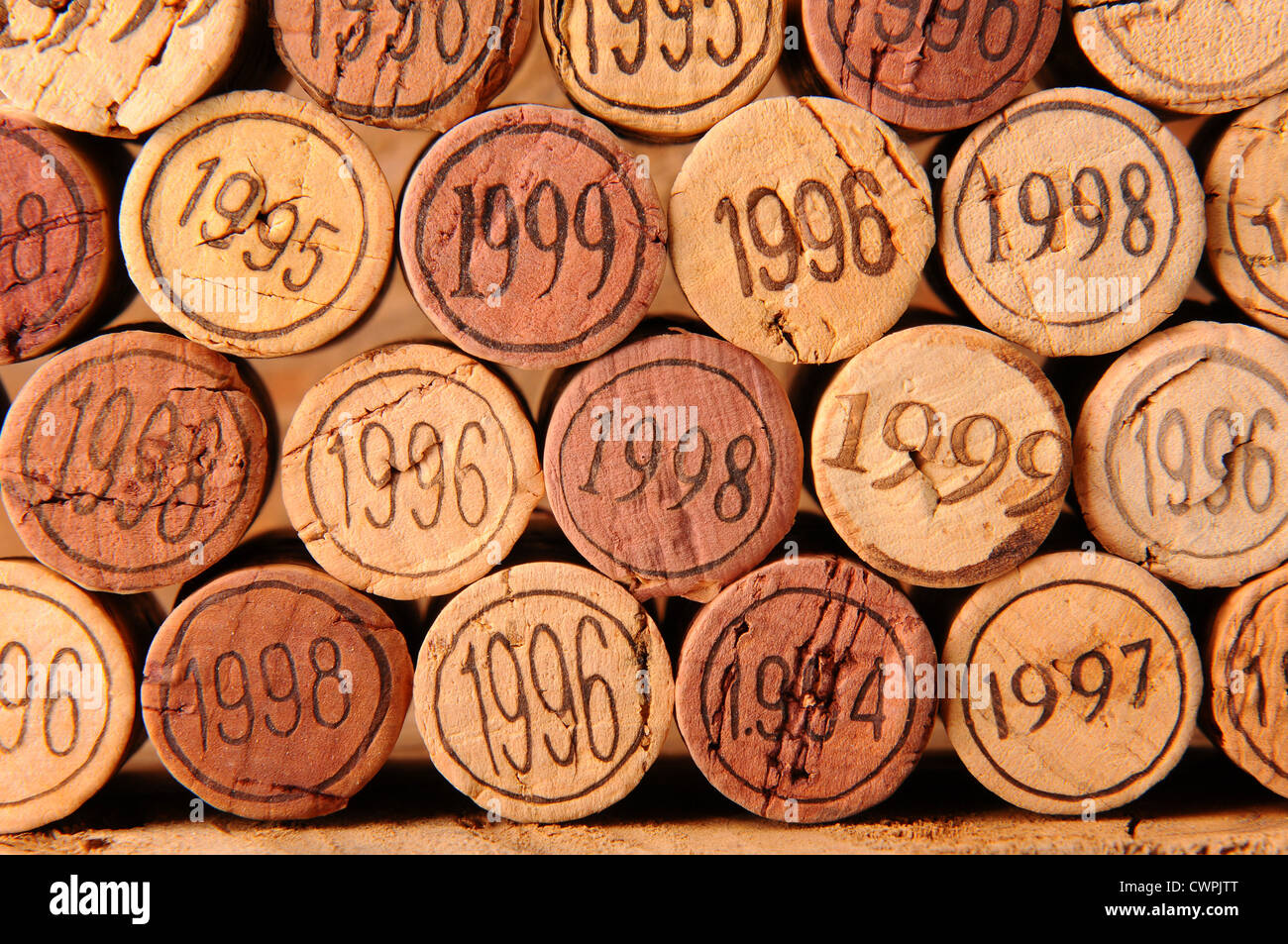 Closeup of several wine corks with the vintage year stamped into the end. Stock Photo