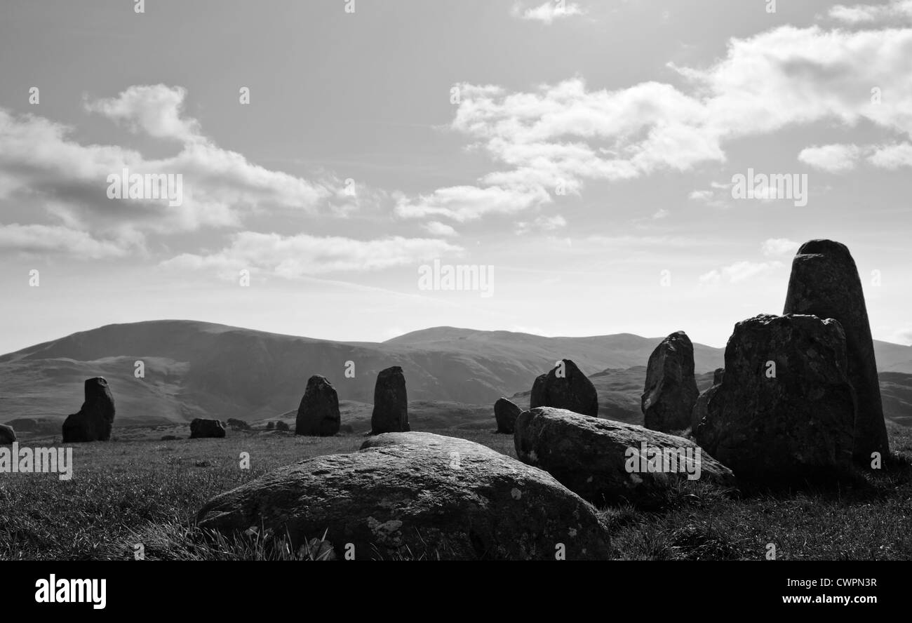 some people explore the spiritual nature of Castlerigg stone circle in the lake district, cumbria Stock Photo