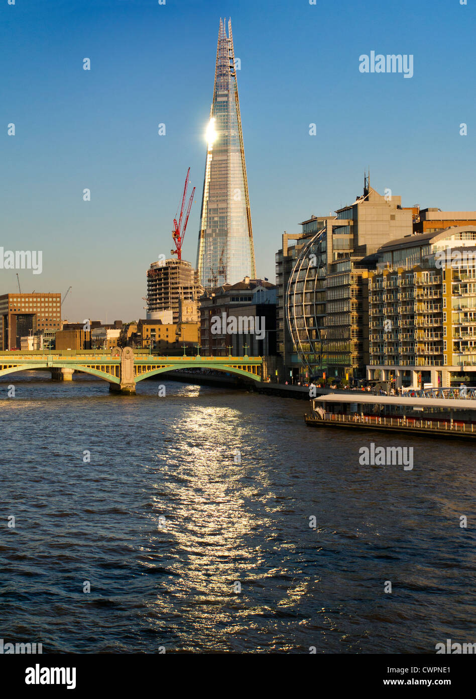 The Shard and Southwark Bridge, viewed from the Millennium walkway, Autumn late afternoon Stock Photo