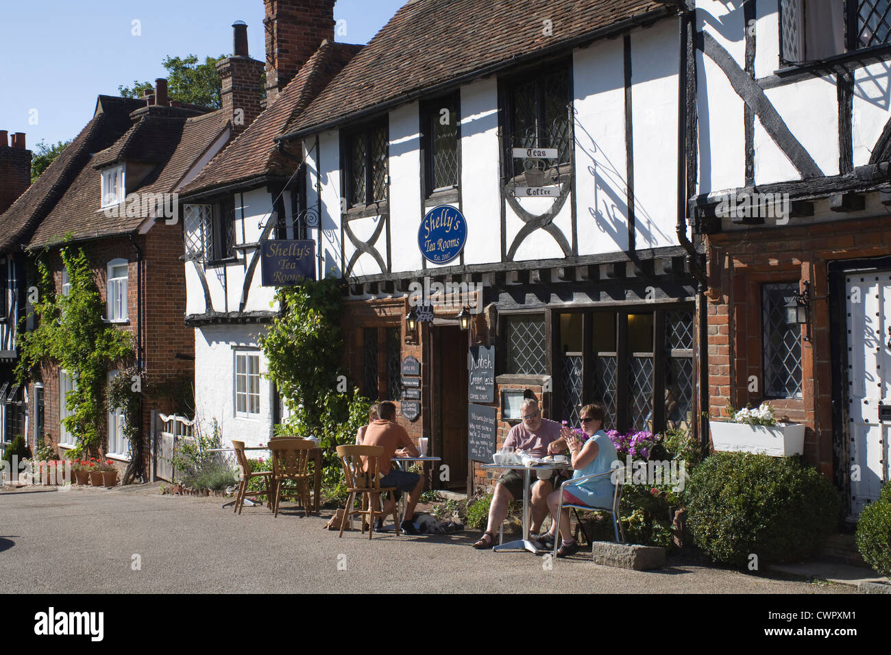 Chilham Kent Visitors sitting out in summer sunshine enjoying Kentish