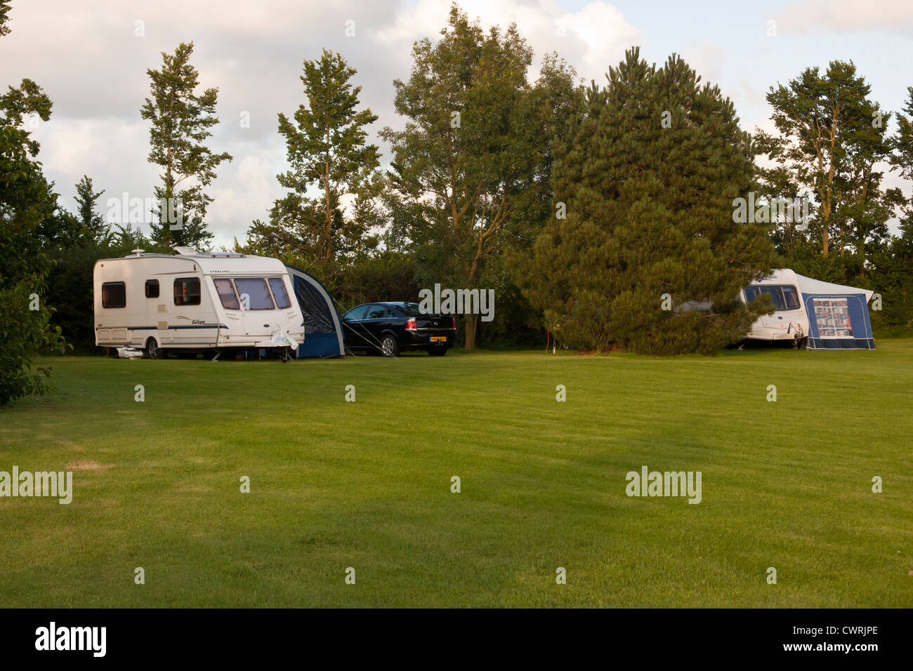 Caravans on small caravan club site called a CL 'certified location' near Wadebridge Cornwall England UK. Stock Photo