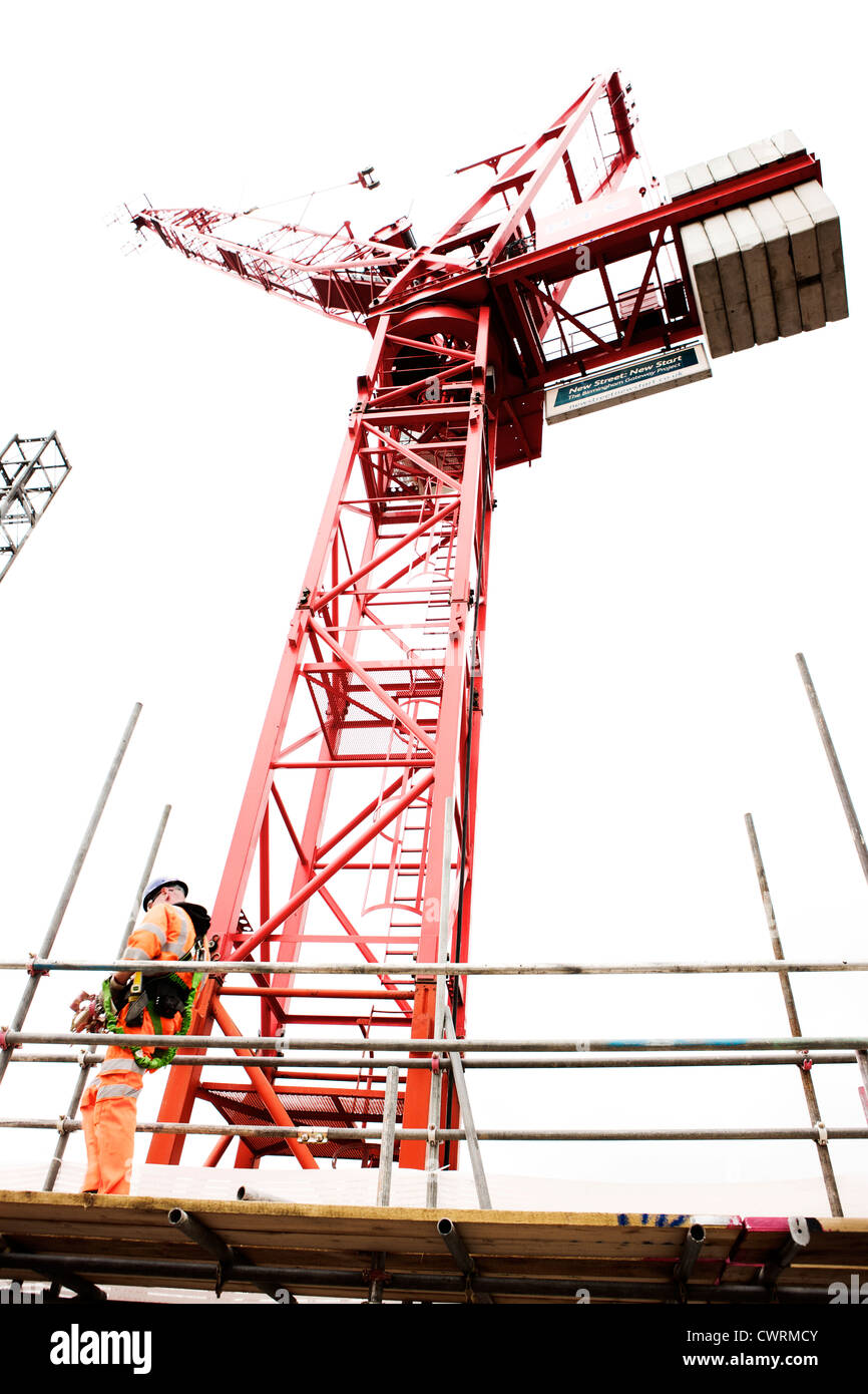 Scaffolding and crane at construction site UK Stock Photo Alamy