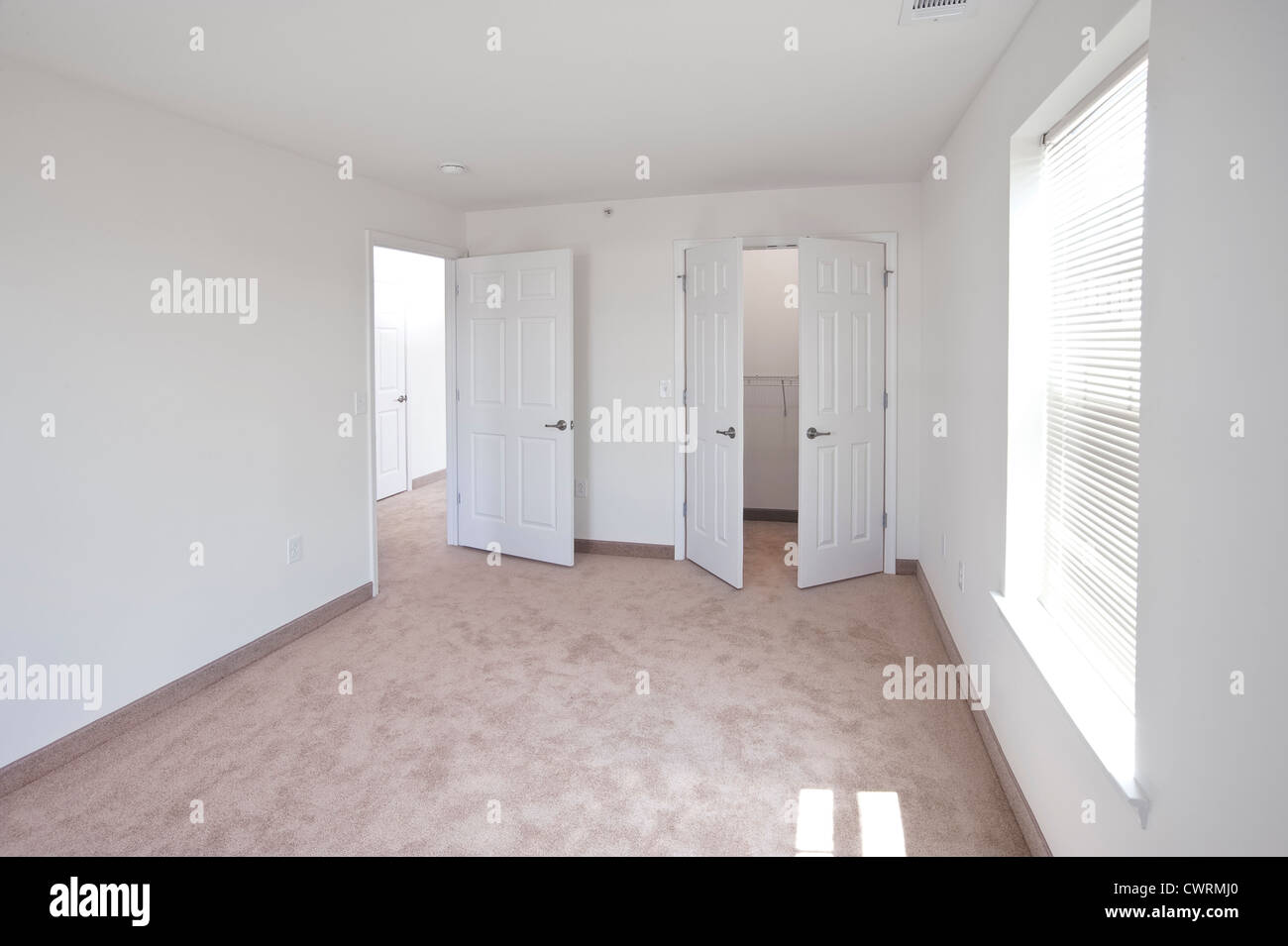 Empty Room In Unoccupied Apartment Flat Stock Photo