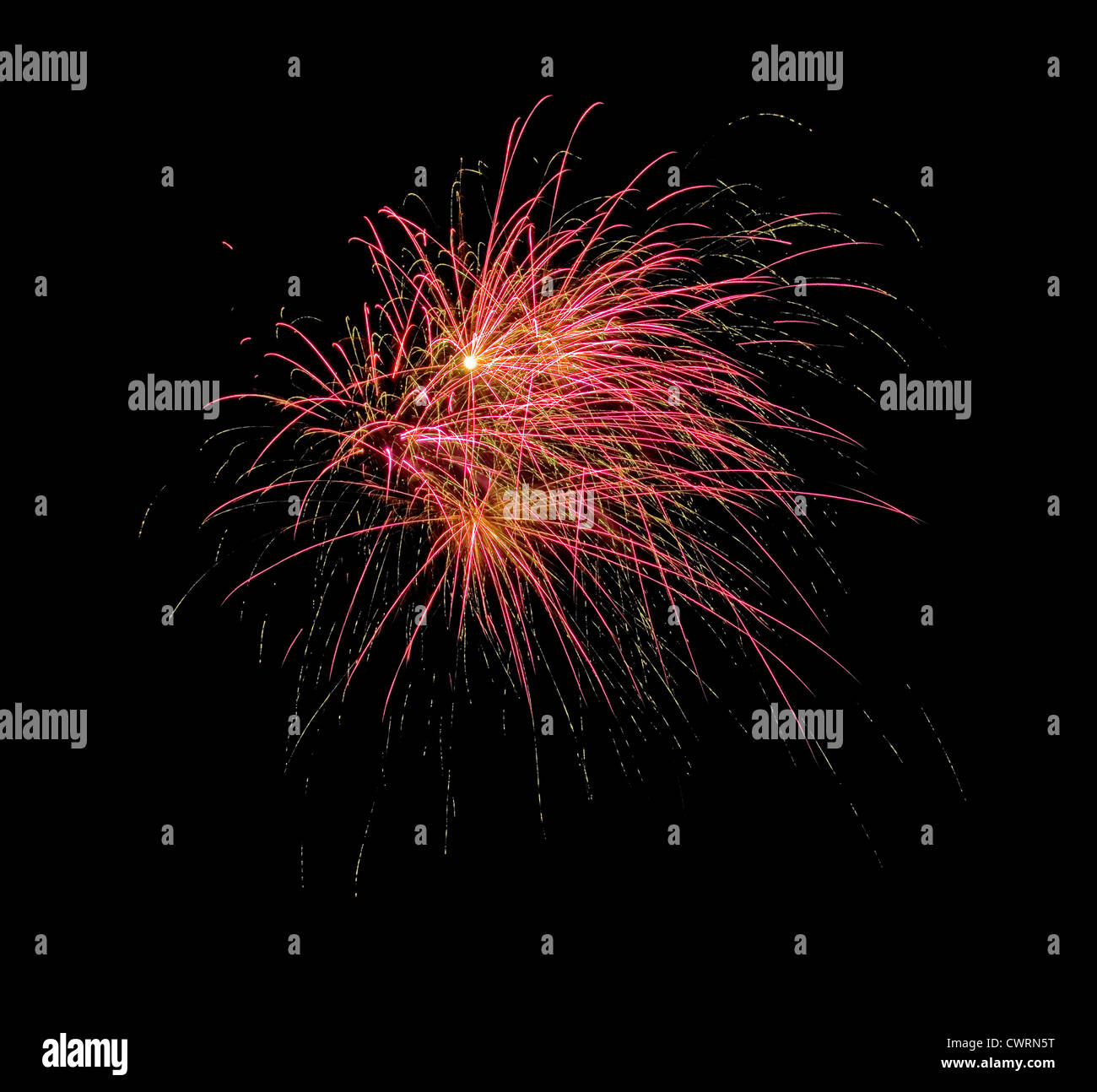multiple fireworks explode in a burst with black background Stock Photo
