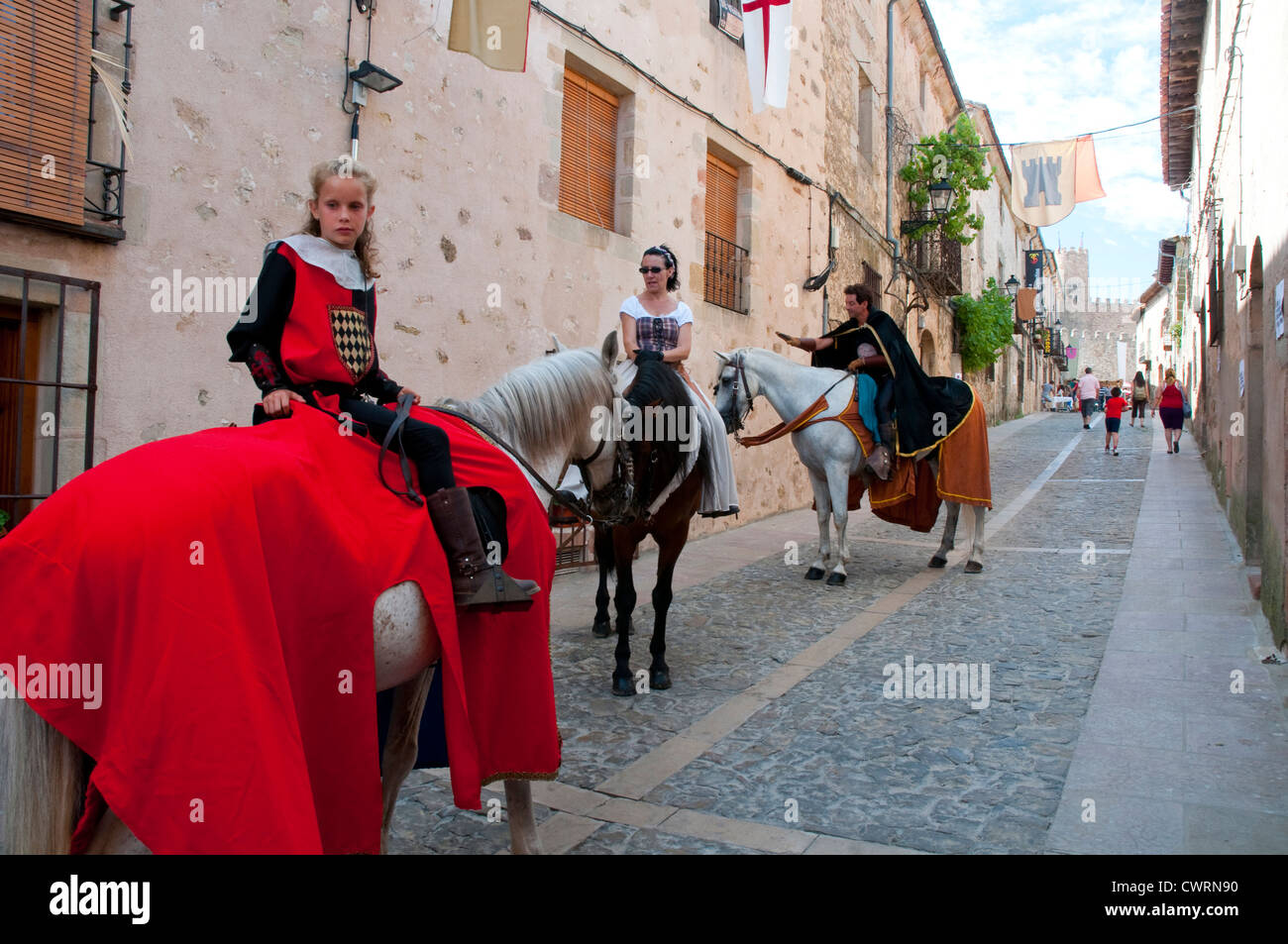 People riding horses at medieval parade. Medieval Days, Sigüenza ...