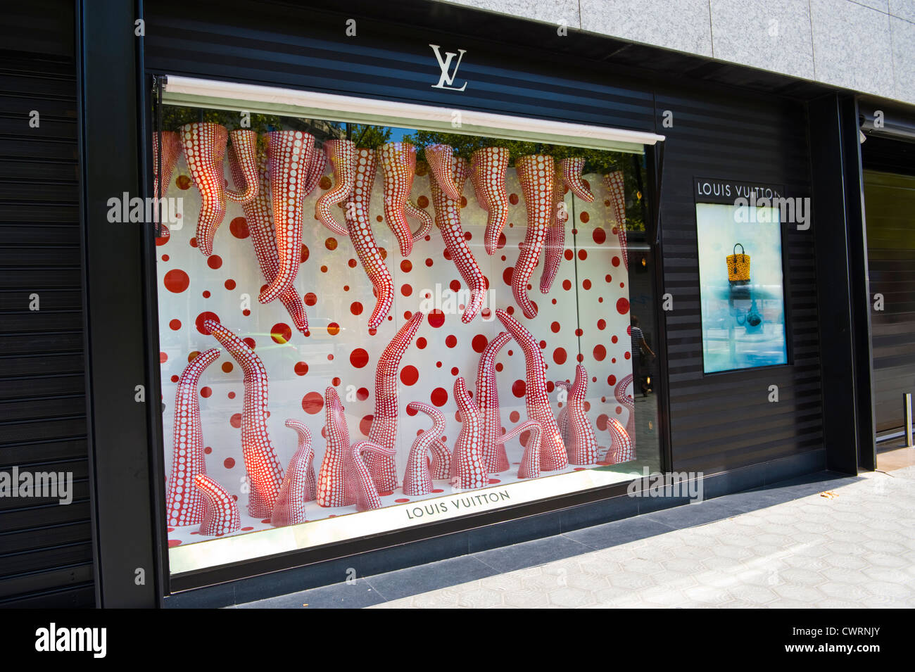 Exterior of Louis Vuitton store with original artwork window