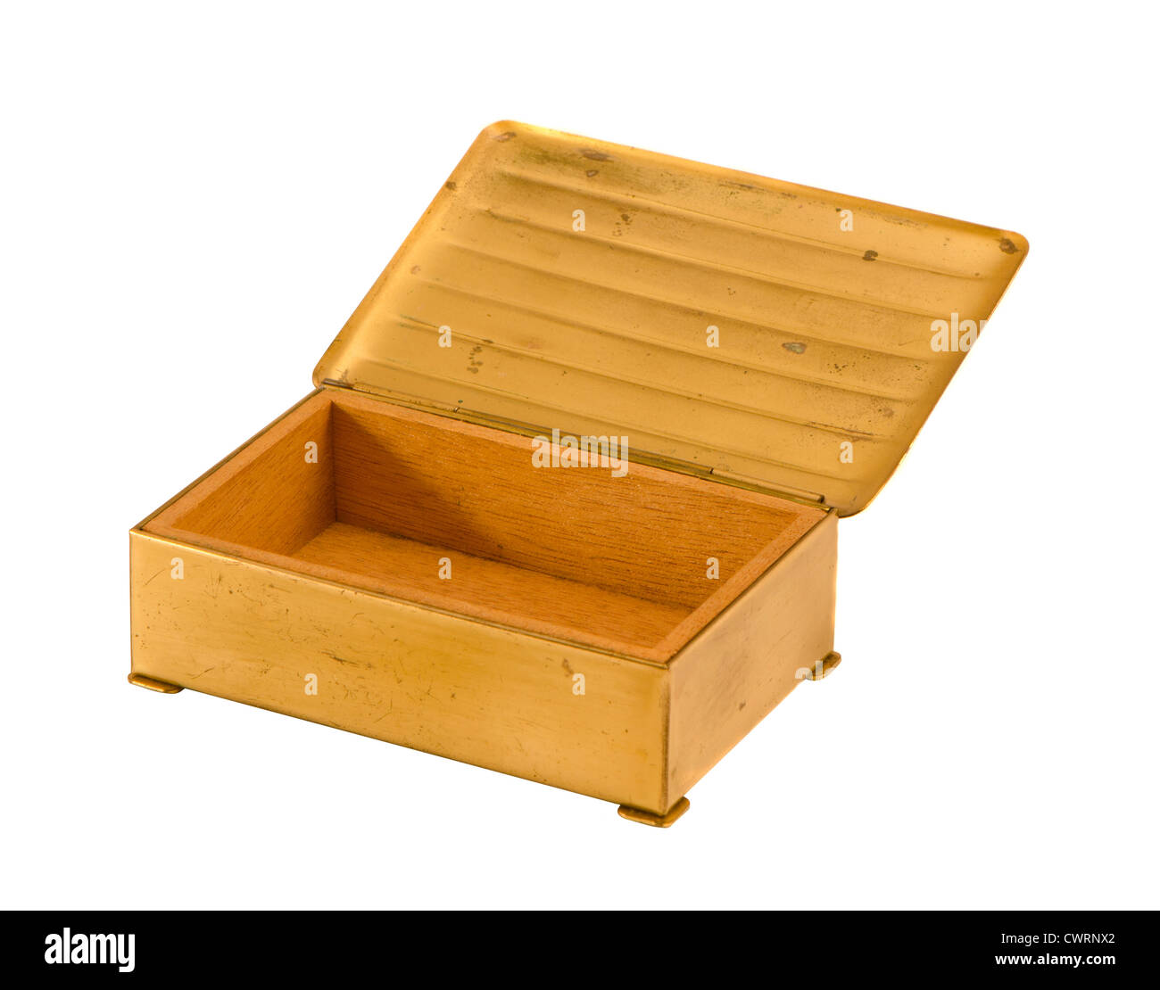 Gold color metal wooden antique jewelry box with open lid isolated on white background Stock Photo