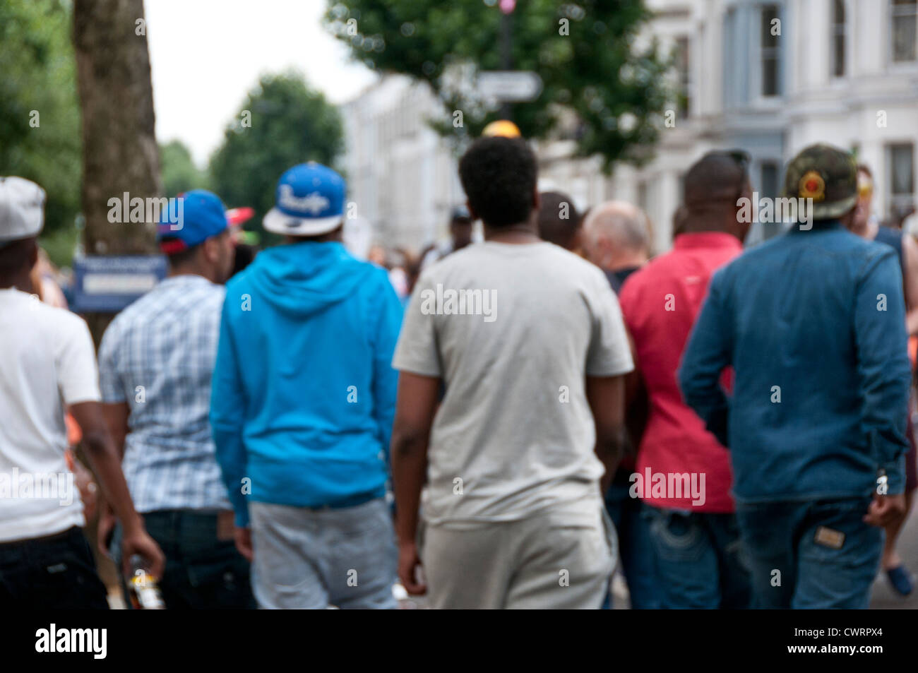 Group of West Indian youths in West London street Stock Photo