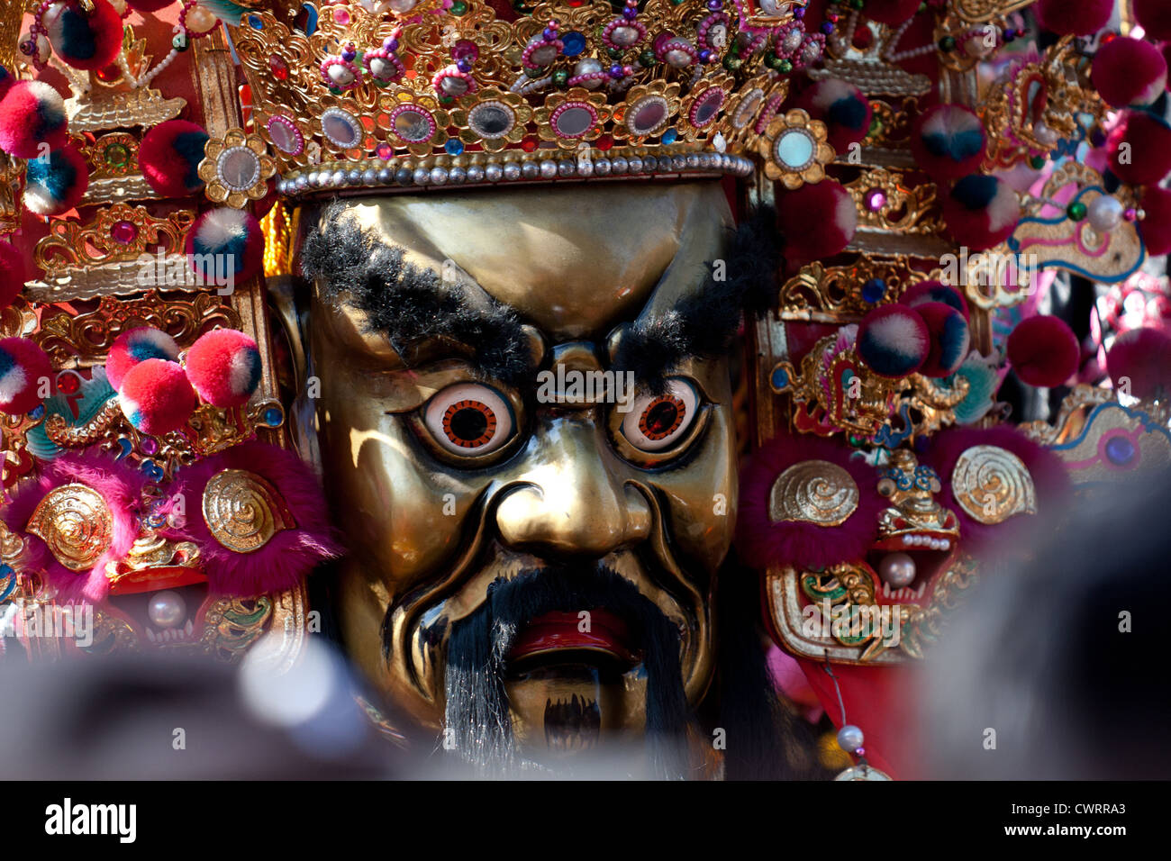 A mask of a taoist god at the "Pigs of God" festival around Chinese New