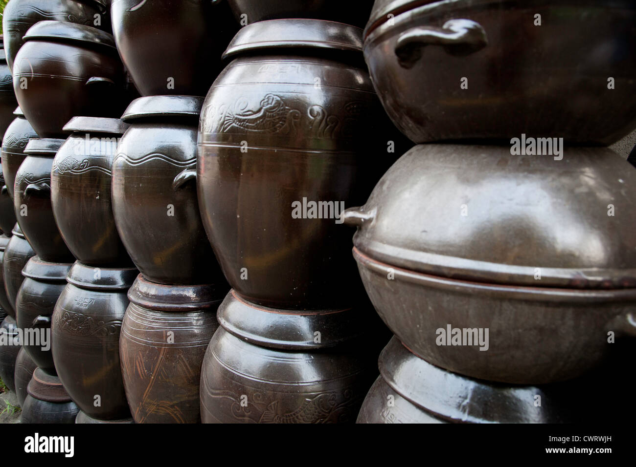 Stacks of Korean Kimchi jars along a wall Stock Photo Alamy