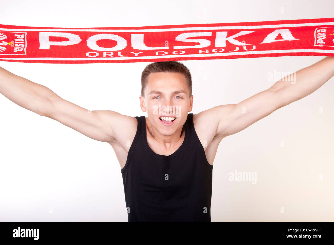 Portrait of a young beautiful male Poland fan. Stock Photo