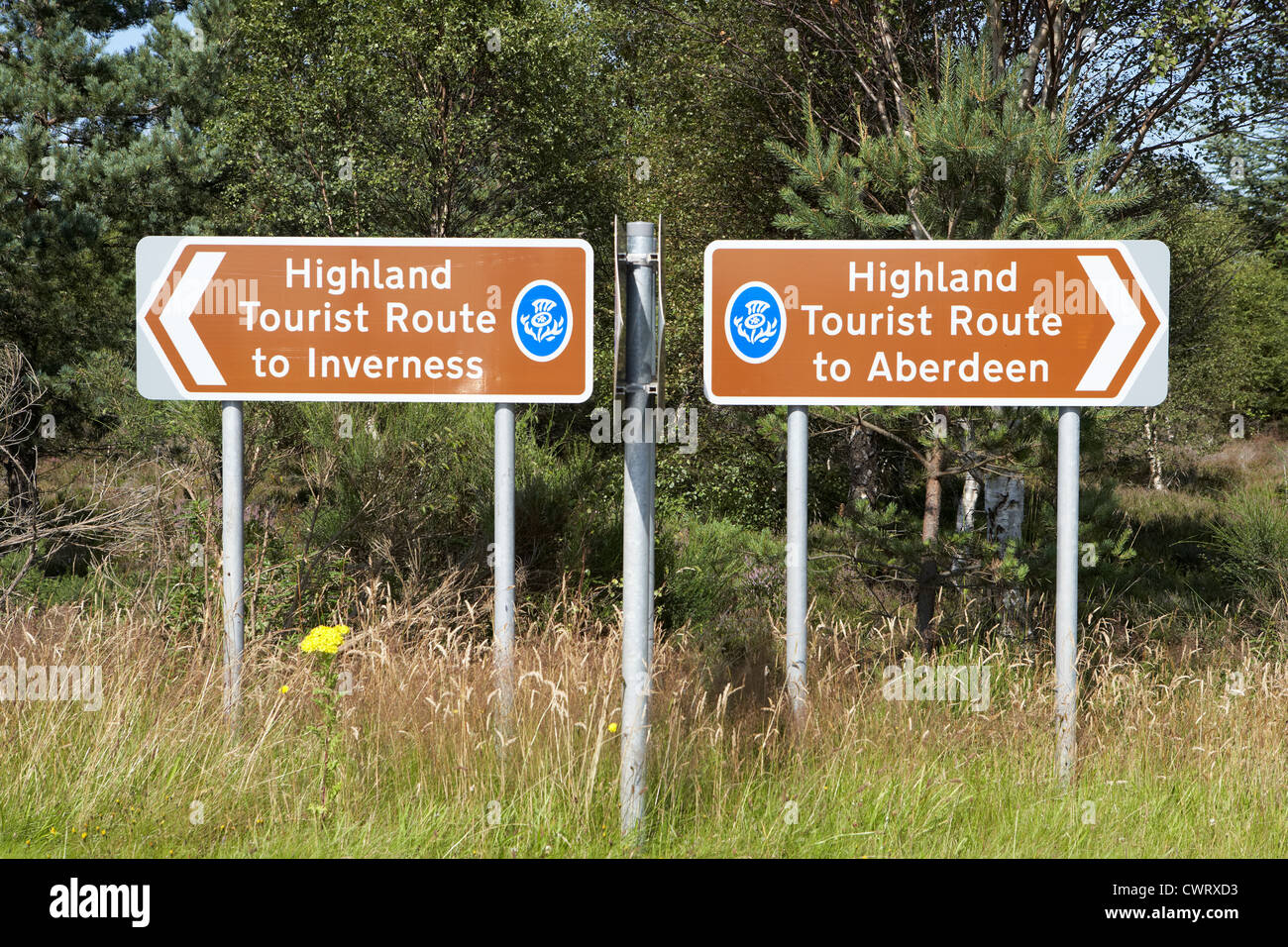 roadside signs for highland tourist routes to inverness and aberdeen highlands scotland Stock Photo